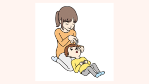 子どもに点眼する様子のイラスト